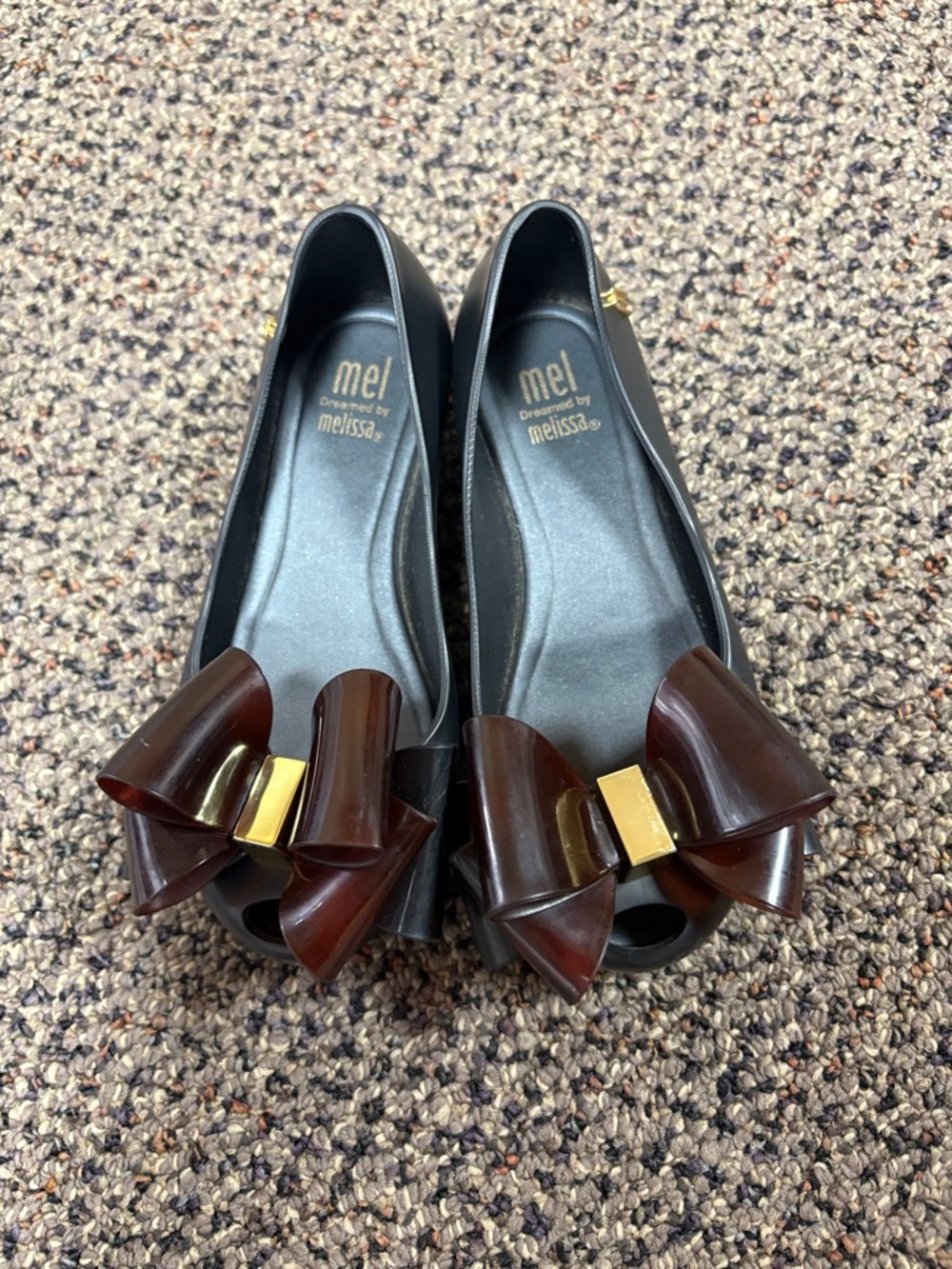Mel by Melissa Black Peep-Toe Jelly Flats with Brown Bow and Gold Accent